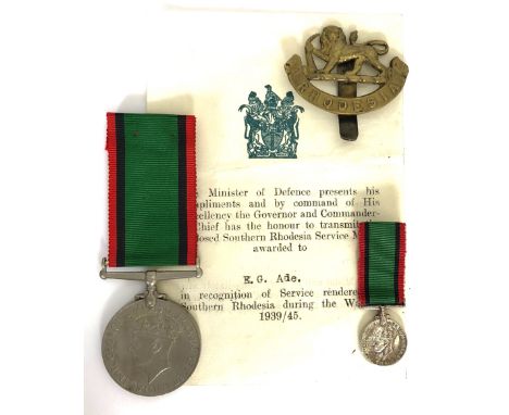 WW2 Attributed Southern Rhodesia War Service Medal and Issue Slip.  This rare example is attributed to Mr Edwin George Ade, w