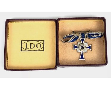 German Third Reich MINIATURE boxed Mother's Cross 2nd Class.  Good silvered example with blue and white enamelled arms and ce