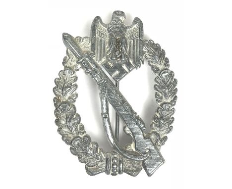 German Third Reich WW2 Army / Waffen-SS Infantry Assault badge. A good die-stamped silvered issue. Rifle with fixed bayonet s