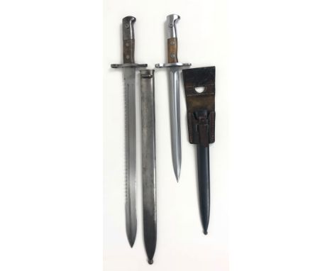 Switzerland M1914 Schmidt Rubin Sawback Bayonet & One Other This example with a 19 inch single edged wide blade. Central full