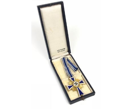 German Third Reich. 1st class Cross of Honour of the German Mother in case of issue.  A fine gilt example with blue and white