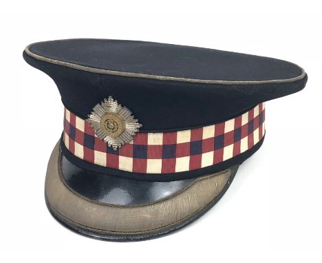 Scots Guards Officer's peaked forage cap.  A good mid 20th Century example of dark blue melton cloth body, patent leather pea