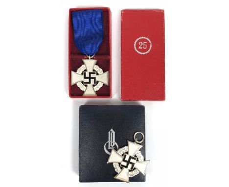 German Third Reich cased Faithful Service Decoration 25 years and another.  A fine silvered example with black enamel swastik