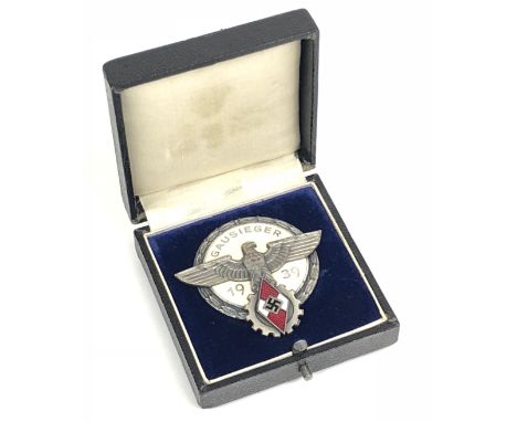German Third Reich cased 1939 Gau Victor Badge by  G. Brehmer, Markneukirchenin.  Fine scarce die-cast silvered award for Nat