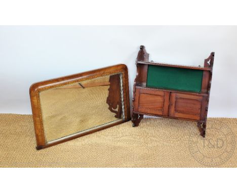 An Edwardian walnut hanging shelf, with two cupboard doors, 70cm H x 61cm W, with a late Victorian walnut over mantle mirror,