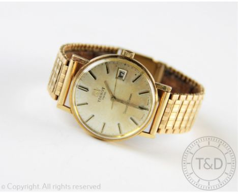 A gents Tissot Seastar Seven wristwatch, the silvered dial with batons and subsidiary calendar dial, with gold hands and cent