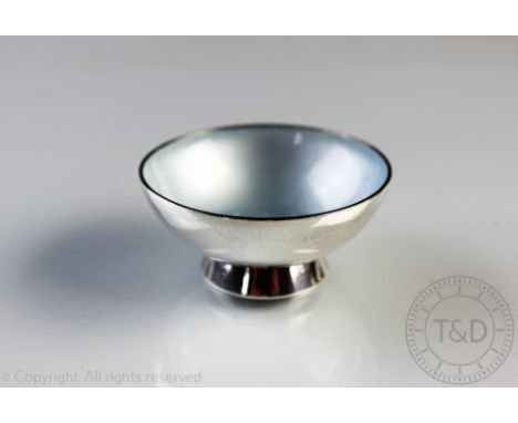 A miniature Danish sterling silver and enamel bowl, with plain polished exterior and blue enamel lining to the interior, flor