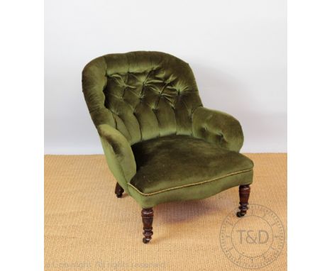 A Victorian tub chair, with button back green upholstery, on turned legs, with an Edwardian folding chair (2)