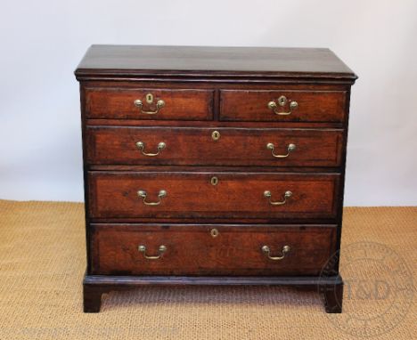A George III and later oak and walnut inlaid chest, of two short and three graduated drawers, on bracket feet, 99cnm H x 104c