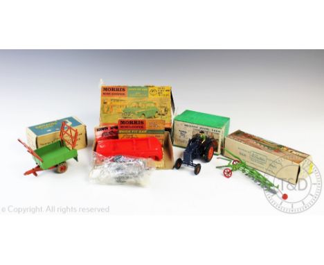 A Britains 128F Fordon Major Tractor in original box, with a Britains 130F tipping trailer and a 138F plough, both in origina