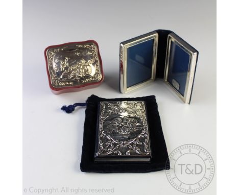 A silver mounted folding double photograph frame, Carr's of Sheffield Ltd, Sheffield 1992, 10cm high, a silver mounted addres