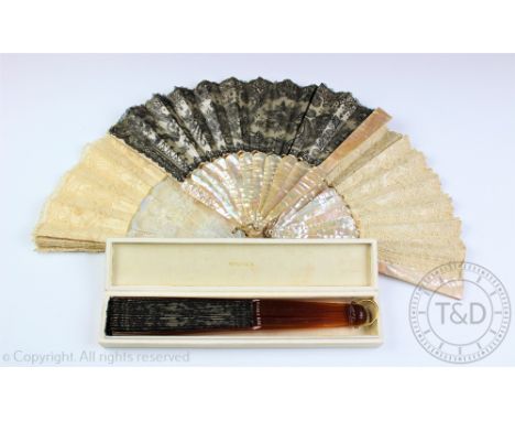 An early 20th century black lace and faux tortoiseshell fan, in a Tiffany & Co box, 55cm open, with two abalone shell fans an