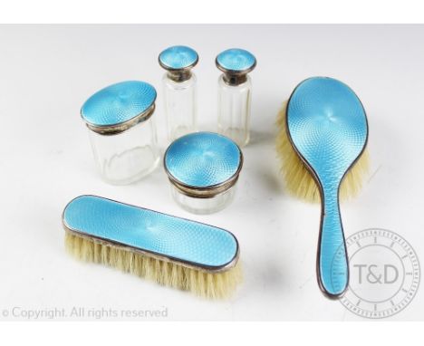 An Art Deco silver and turquoise guilloche enamel dressing table set, Lionel Smith & Co, Birmingham 1927, comprising; a hair 