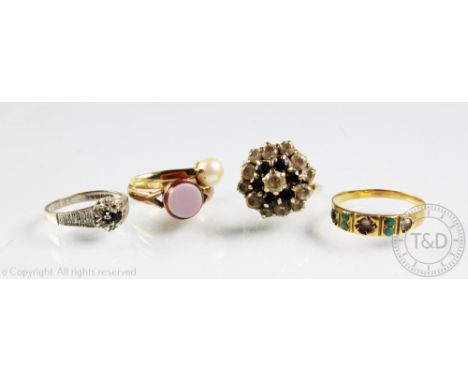 Five rings, to include; an 18ct white gold sapphire and diamond cluster, a turquoise ring in yellow metal stamped '18ct', an 