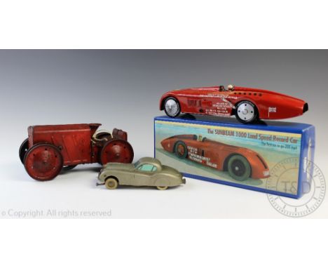A Triang tin plate model tractor, with a Prameta clockwork Jaguar XK 120, a Dinky Hotchkiss car and a Schylling clockwork Sun