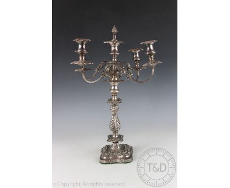 A late Victorian silver plated five light candelabrum, cast with flowers and scrolls, 55cm high (at fault) CONDITION REPORT: 