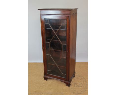 An Edwardian mahogany display cabinet of slender proportions, with astraglazed glazed door, on ogee bracket feet, 157cm H x 6