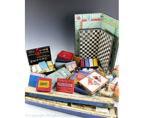 A collection of vintage playing cards, board games, counters, etc, including Japanese wood finger puppets, 'Whip - The Grown 