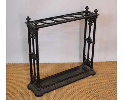 A Coalbrookdale style cast iron six section stick stand, 62cm H x 62cm W