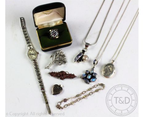 A collection of silver and silver coloured jewellery, to include; a Caithness Jewellery ring, a locket and chain, a Victorian