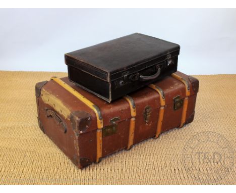 A vintage canvas and wooden bound travelling steamer trunk, 84cm wide, a vintage suitcase initialled 'C.T.P', enclosing a sel