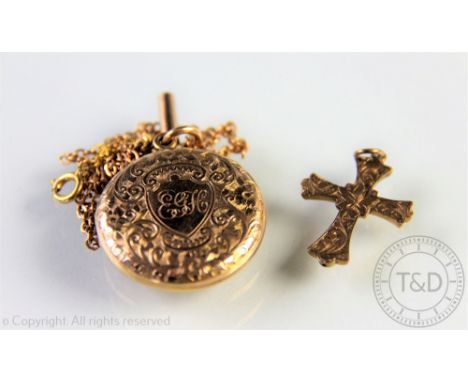 An Edwardian 9ct yellow gold locket Chester 1906, with an attached fine chain stamped '9ct', gross weight 9.2gms along with a