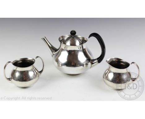 A silver plated Elkington three piece Art Deco style tea service, designed by Eric Clements, teapot with ebonised handled and