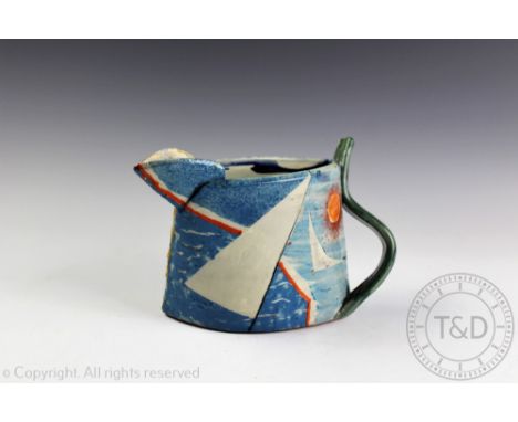 A Paul Jackson studio pottery textured seascape jug, decorated with boats at sea, signed and dated '04', sinuous shaped handl