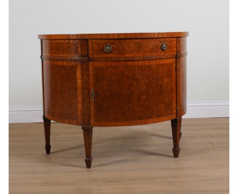 A GEORGE III STYLE FIGURED WALNUT DEMI LUNE COMMODE80cm wide; 50cm deep; 83cm high