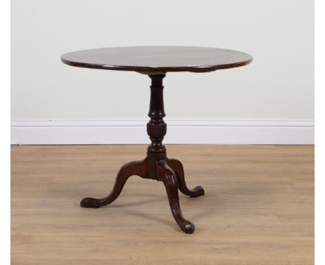A GEORGE III MAHOGANY SNAP TOP TRIPOD TABLE84cm diameter; 71cm high