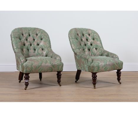 GEORGE SMITH; A PAIR OF GREEN BUTTON BACK, FLORAL UPHOLSTERED SLIPPER BACK ARMCHAIRS (2)On turned supports, 52cm wide; 80cm h