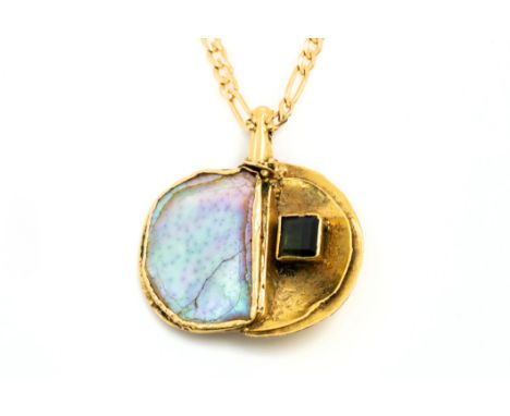 A GOLD AND GEM SET PENDANT WITH A GOLD NECKCHAIN (2)The mother-of-pearl and dark green gem set pendant of abstract design, de