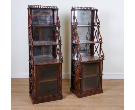 A PAIR OF 19TH CENTURY ROSEWOOD SIDE CABINETS (2)Each with three tier waterfall open shelves over glazed cupboard, 56cm wide;