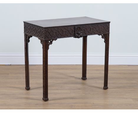 A CHIPPENDALE STYLE RECTANGULAR  MAHOGANY CENTRE TABLEWith extensive blind fret decoration, 79cm wide; 46cm deep; 73cm high