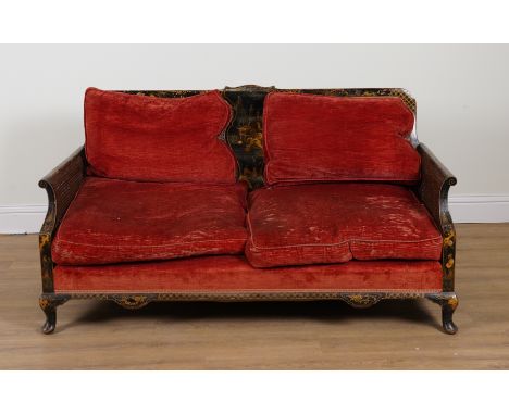 A LATE VICTORIAN CHINOISERIE DECORATED TWO-SEATER CANE SOFA157cm wide; 83cm highProvenance: The Late Lady Williams of Elvel (