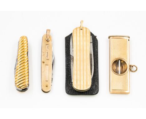 THREE POCKET KNIVES AND A 9CT GOLD MOUNTED CIGAR CUTTER (4)Comprising; a 9ct gold mounted twin bladed pocket knife, with engi