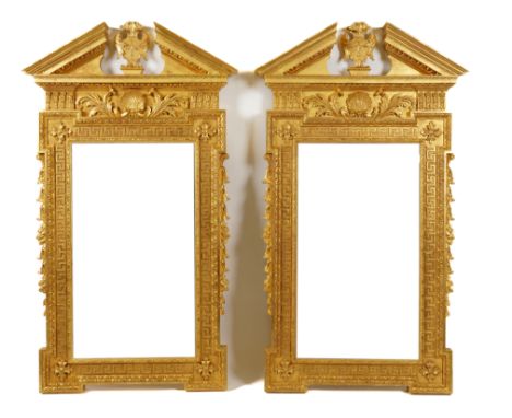 A PAIR OF GEORGE II STYLE GOLD PAINTED WALL MIRRORS (2)Each with cartouche centred architectural cornices, 93cm wide; 152cm h