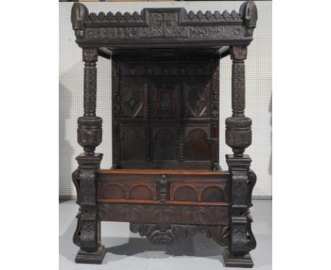 AN OAK FOUR POSTER BED WITH PANELLED CANOPY AND HEADBOARDElements 17th century and later, 155cm wide; 198cm deep; 233cm highB