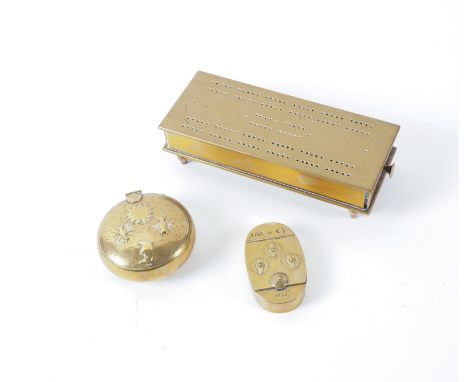 TWO LOCKING BRASS SNUFF BOXES AND A BRASS CRIBBAGE SET (3)Probably English, 18th Century and later The circular snuff box wit