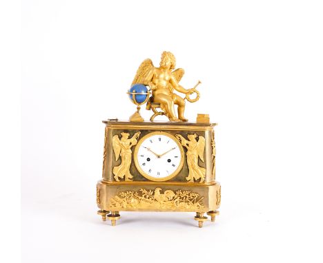 A FRENCH EMPIRE STYLE ORMOLU MANTLE CLOCKEarly 19th Century The white dial flanked by allegorical winged figures, the base wi