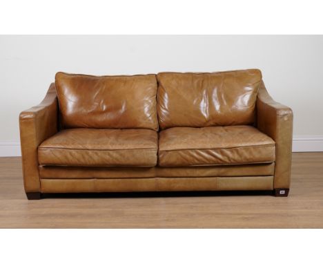 A TAN LEATHER SQUARE BACK TWO SEAT SOFA148cm wide; 75cm highCondition report: the leather is faded and worn particularly the 