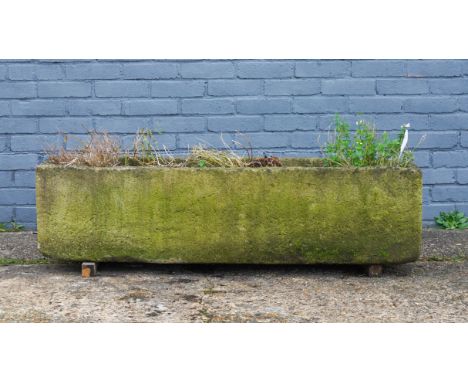 A STONE RECTANGULAR PLANTER136cm long; 34cm deep; 35.5cm high