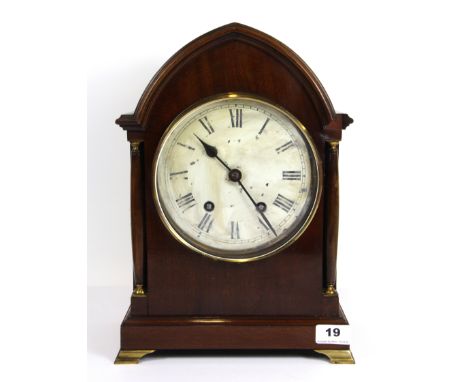An Edwardian mahogany arched mantle clock, H. 36cm.