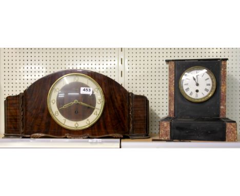 A Kienzle mantle clock and a slate mantle clock.