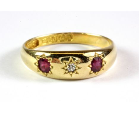 An 18ct yellow gold diamond and ruby set gypsy ring, ()).