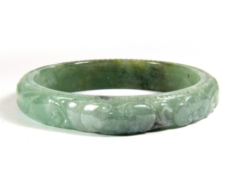 A very fine Chinese mixed colour jadeite jade carved bangle, internal Dia. 7.7cm.