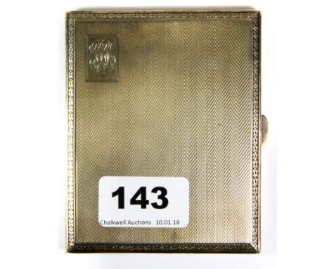 An Art Deco hallmarked silver cigarette case with engine turned decoration, 8.5 x 10cm.