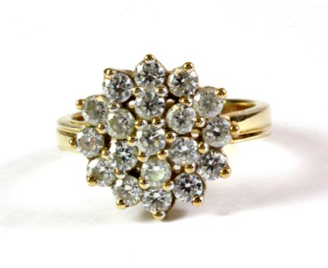 A 9ct yellow gold stone set cluster ring, (K).