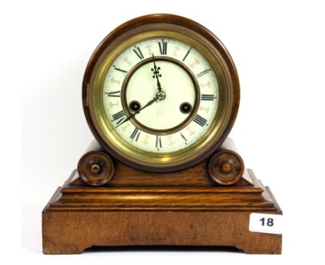 A 19th century oak mantle clock, H. 27cm.