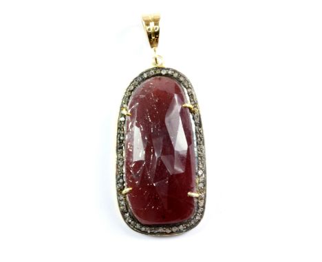 A large yellow metal mounted ruby and diamond pendant on a 22ct gold bale, L. 4.5cm.